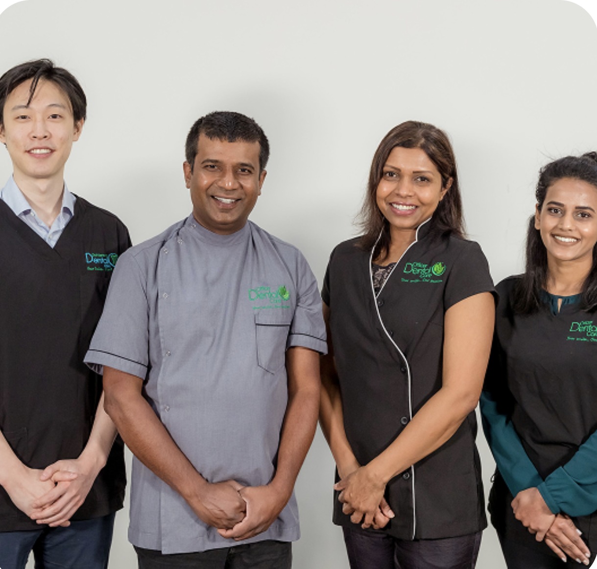 The Dandenong Dental Care dentists and clinical team standing together